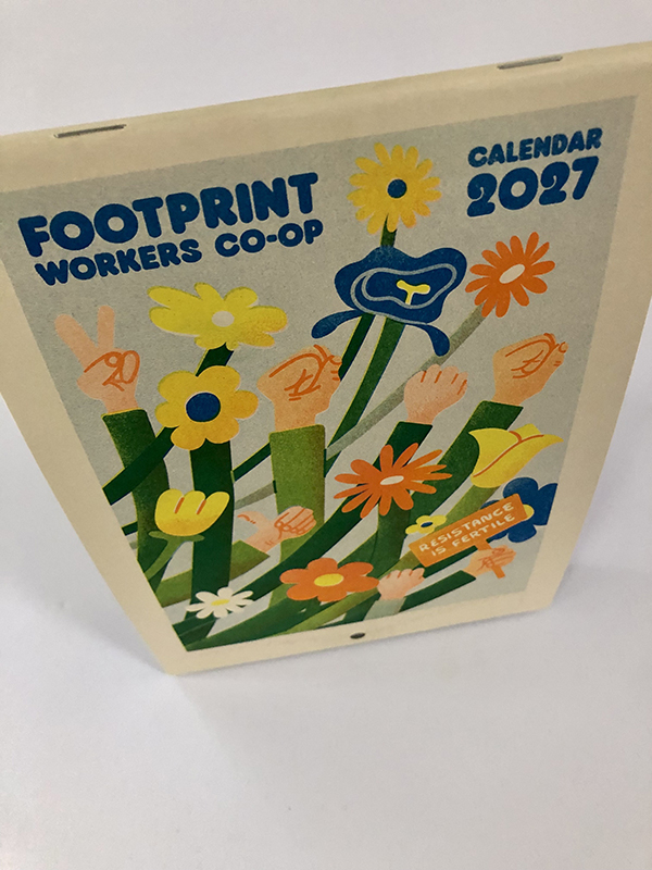 Footprint Workers Co-operative 2027 calendar photographed from above.